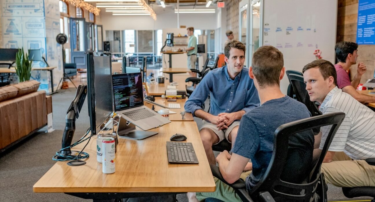 Business team collaborating on a customer acquisition plan